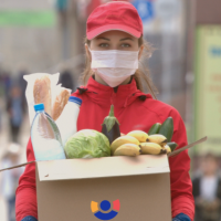 Women holding groceries